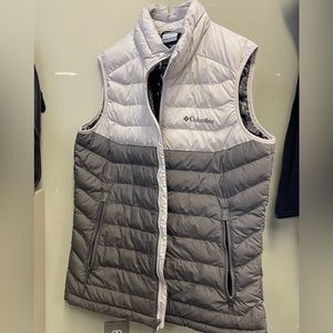 Columbia down vest, nearly total new, M size. Great deal